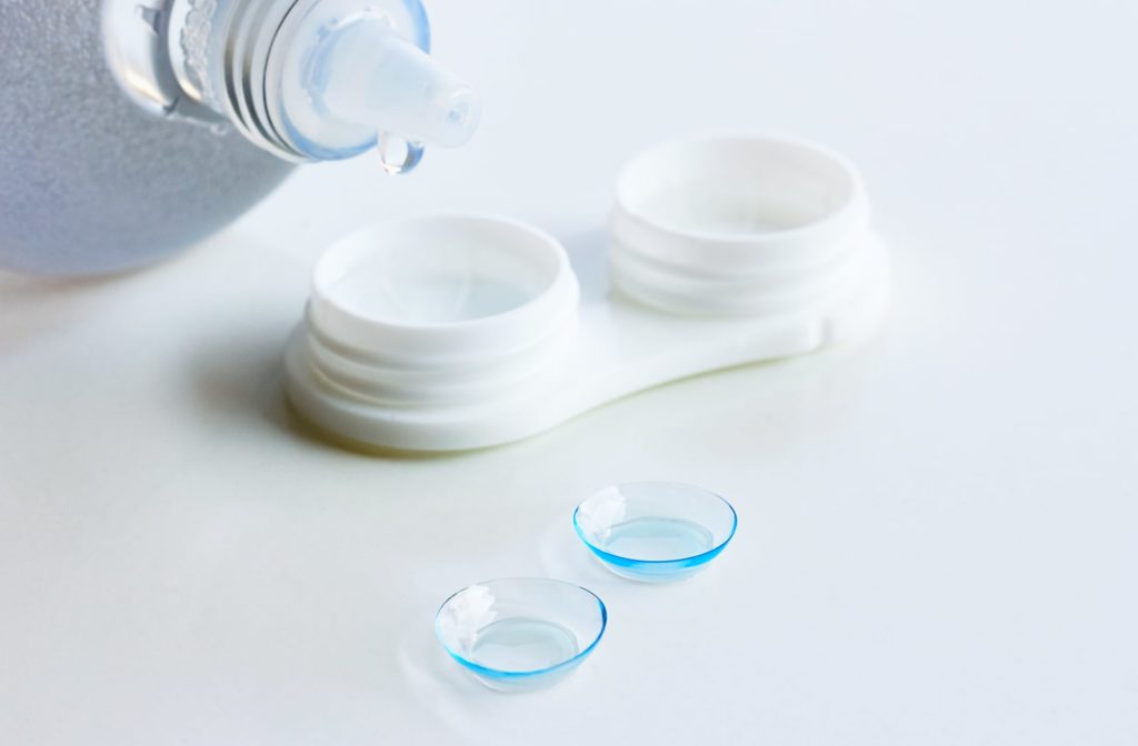 A bottle of contact lens solution, a contact lens case and contact lenses